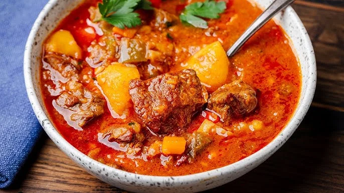 What is the most iconic food market in Hungary known for paprika and traditional dishes?